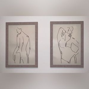 Pair of female line drawings framed